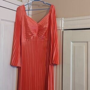 Coral pleated dress